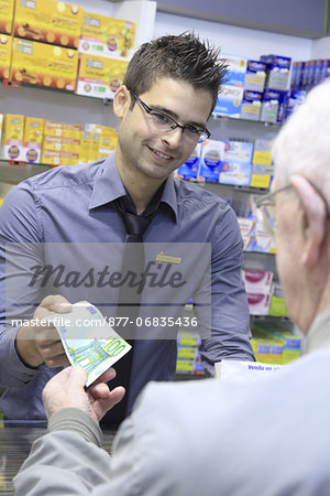 France, drugstore, pharmacist with a customer