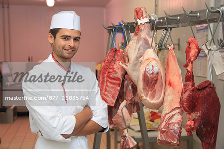 France, supermarket, young butcher.