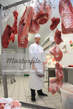 France, supermarket, young butcher.