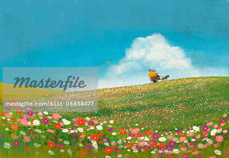 Man riding cart on hill with flowers in foreground