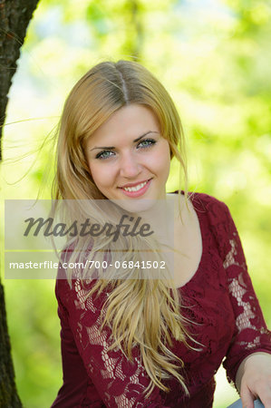 Portrait of a young blond woman outdoors in spring, Germany