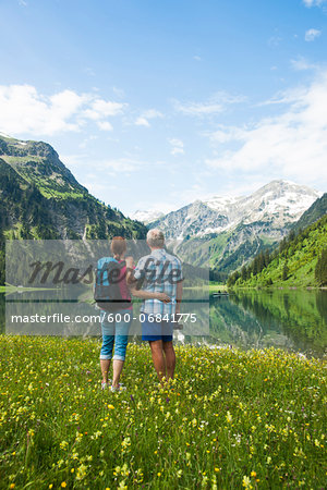 Couple Hiking by Lake, Vilsalpsee, Tannheim Valley, Tyrol, Austria