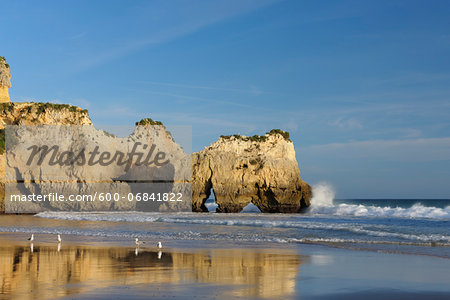 Natural Arch Rock Formations at Praia dos Tres Irmaos and Atlantic Ocean, Alvor, Portimao, Algarve, Portugal