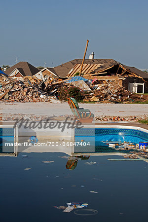 Chair beside Swimming Pool in Neightbourhood Damaged by Tornado, Moore, Oklahoma, USA. Chair beside Swimming Pool in Neightbourhood Damaged by Tornado, Moore, Oklahoma, USA.