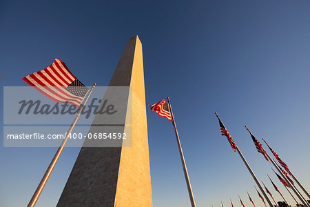 Washington Monument at Sunset with US flag