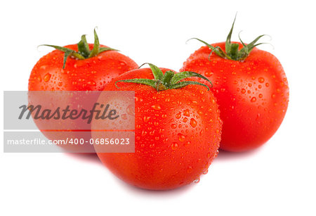 Three ripe red tomato with water drops isolated on white background