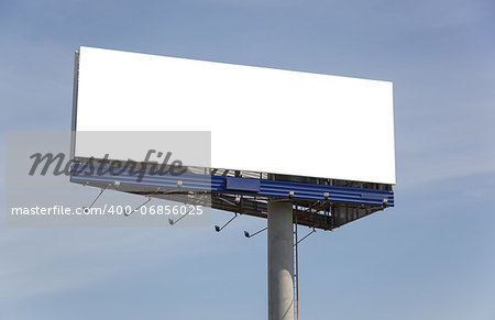 Big empty billboard over blue sky background