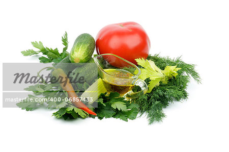 Arrangement of Ripe Tomato, Cucumbers, Chili Pepper, Parsley, Dill, Celery and Glass Gravy Boat with Olive Oil and Spices isolated on white background