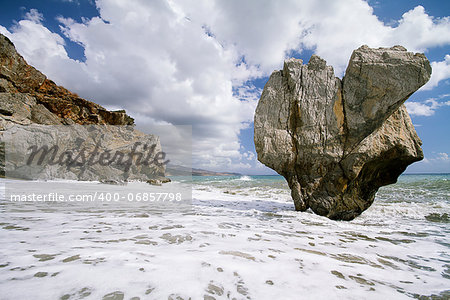 Huge rock in the sea.