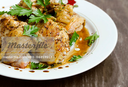 Grilled Chicken legs with sauce and parsley