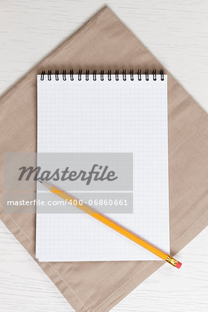 recipe notepad on wooden table with pencil