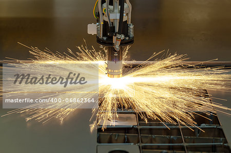 Plasma cutting metalwork industry machine with sparks