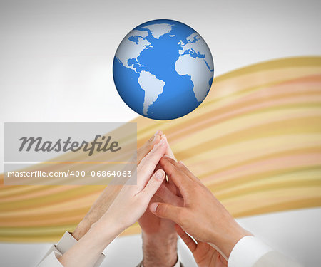 People reaching hands up to a globe against white background with orange wave