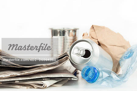 Recyclable rubbish on white background