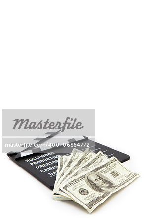 Slate and money lying against white background