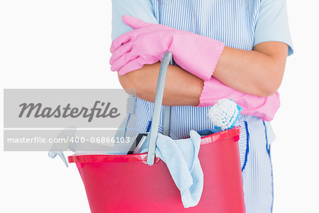 Cleaner holding a pink bucket in the white background