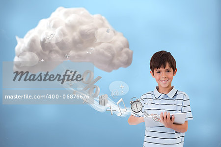 Cute boy using tablet to connect to cloud computing on blue background