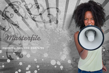 Girl with afro shouting through megaphone with space for text on grey art deco style background