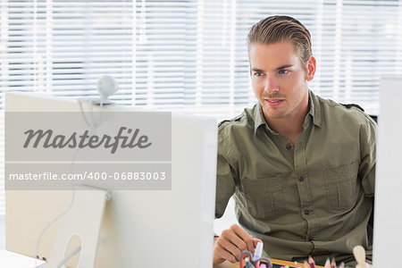 Creative business employee having webcam videocall in a modern office