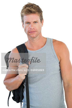 Attractive man in sportswear gesturing on white background