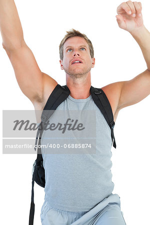 Man doing his exercices on white background