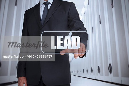 Businessman in a data center selecting label with lead written on it