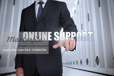 Businessman selecting the term online support in a data center