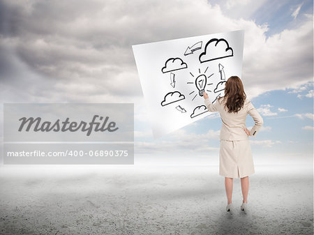 Businesswoman drawing a process on a paper with blue sky on the background