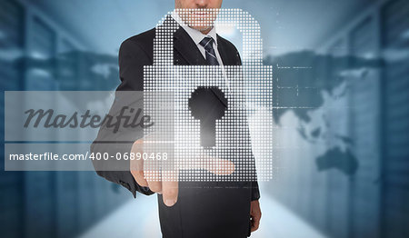 Businessman selecting a digital padlock with a world map on the background