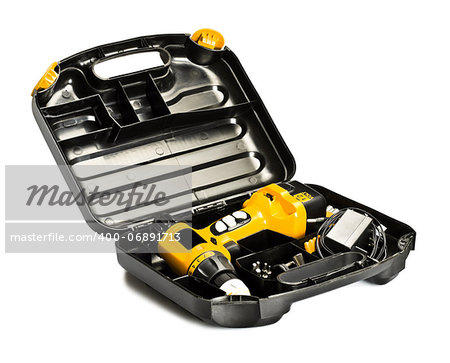toolbox with yellow drill set isolated on white