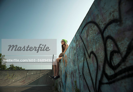 Teenage Girl Hanging out in Skatepark, Feudenheim, Mannheim, Baden-Wurttemberg, Germany