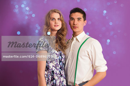 Portrait of young couple and glitter