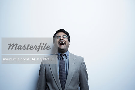 Studio portrait of mid adult male laughing Studio portrait of mid adult male laughing