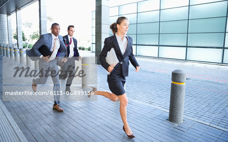 Business people running Business people running