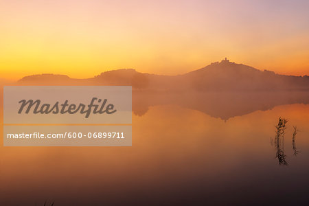 Wachsenburg Castle with Morning Mist reflecting in Lake at Dawn, Drei Gleichen, Thuringia, Germany