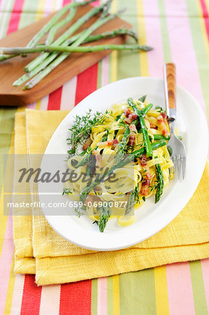 Tagliatelle pasta with asparagus tips, pancetta and thyme