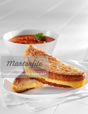 Grilled Cheese Sandwich; Halved; Bowl of Tomato Soup