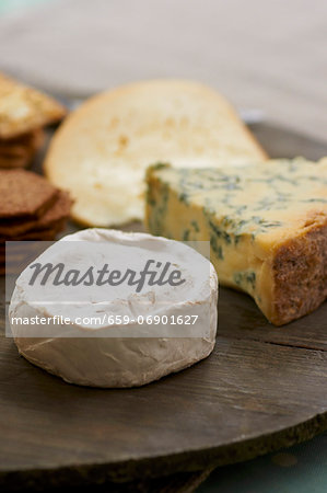 Various Cheese on Wooden Breadboards