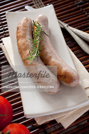 Two fried butifarra (fresh pork sausage, Catalonia)