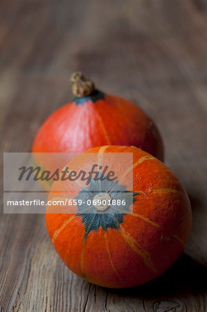 Hokkaido squash on a wooden surface