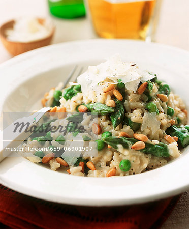 Asparagus risotto with peas, pine nuts and parmesan