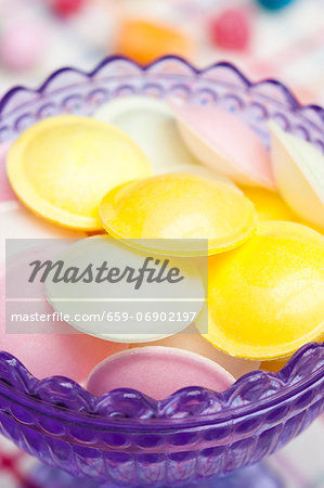 Flying saucer candies in a glass dish