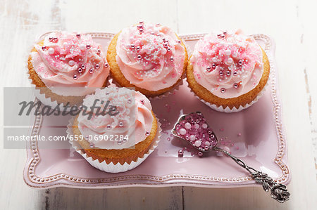 Pink cupcakes with sugar pearls