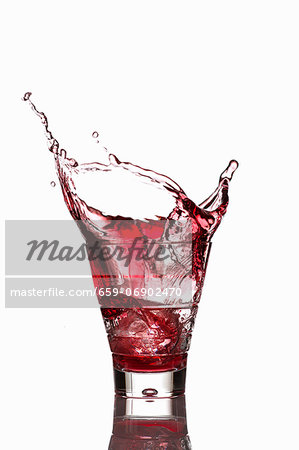 Campari spilling out a glass