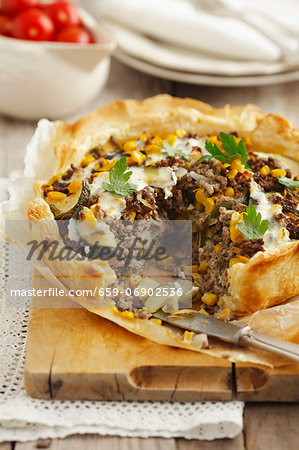 Phyllo tart with beef, zucchini and corn