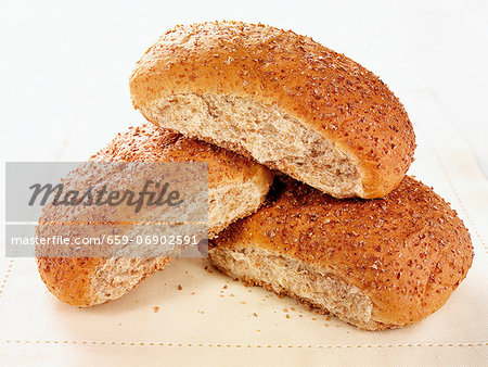 Three oval bread rolls