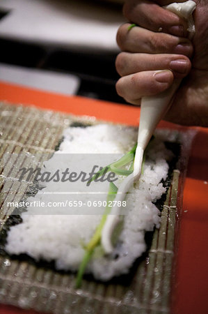 Maki sushi being prepared
