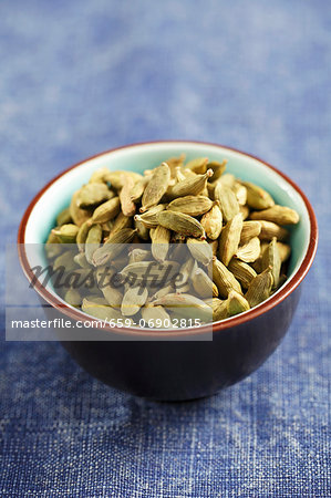 Cardamom pots in a small bowl