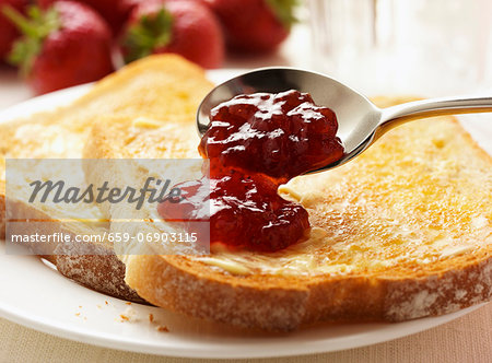 Toast with butter and strawberry jam