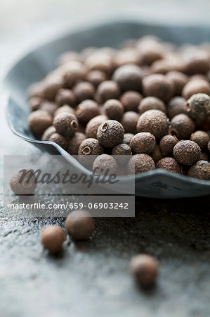 Allspice berries in a small bowl